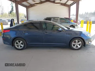 2015 Kia Optima LX with VIN KNAGM4A70F5592109, listed as a IAAI auction lot 42053533 with 159,401 mi miles. Bid and sale history available at carsss.com. Image 13.