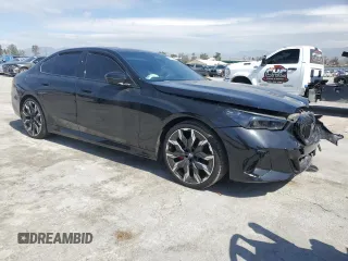 2024 BMW 5 Series 530i z VIN WBA43FJ08RCS17556, wystawiony jako Copart lot #48853495 z przebiegiem 4 151 mil mil oraz Szkoda całkowita • Salvage title. Historia ofert i sprzedaży dostępna na DreamBid. Obrazek 4.