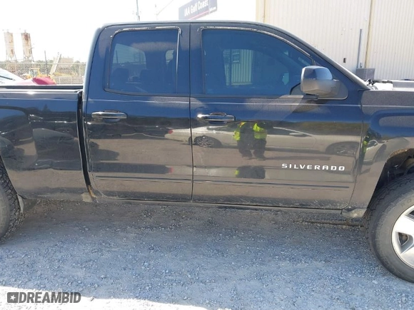 2016 Chevrolet Silverado 1500 LT with VIN 1GCVKREH0GZ201972, listed as a IAAI auction lot 41856573 with 214,086 mi miles. Bid and sale history available at carsss.com. Image 13.