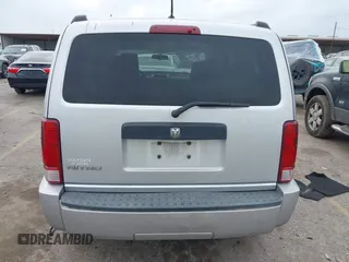 2008 Dodge Nitro SXT z VIN 1D8GT28K38W124264, wystawiony jako IAAI lot #41933674 z przebiegiem 292 756 mil mil oraz . Historia ofert i sprzedaży dostępna na DreamBid. Obrazek 16.