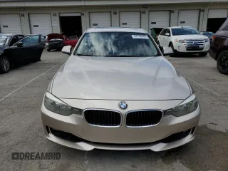 2013 BMW 3 Series 328i with VIN WBA3A5C54DF354201, listed as a Copart auction lot 57764245 with 142,275 mi miles and Salvage title. Bid and sale history available at DreamBid. Image 5.