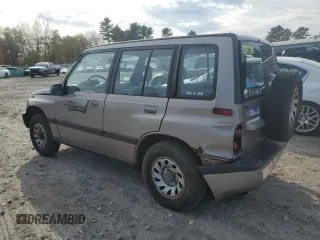 1995 Suzuki Sidekick JX z VIN 2S3TD03V2S6408939, wystawiony jako Copart lot #78862794 z przebiegiem 88 216 mil mil oraz Tytuł czysty. Historia ofert i sprzedaży dostępna na DreamBid. Obrazek 2.
