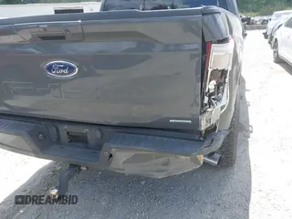 2021 Ford F-150 XL with VIN 1FTFW1E8XMFC04210, listed as a IAAI auction lot 42493373 with 99,181 mi miles and . Bid and sale history available at DreamBid. Image 19.