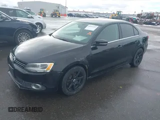 2014 Volkswagen Jetta SE with VIN 3VWD17AJXEM370663, listed as a IAAI auction lot 41612207 with 135,215 mi miles and . Bid and sale history available at DreamBid. Image 2.