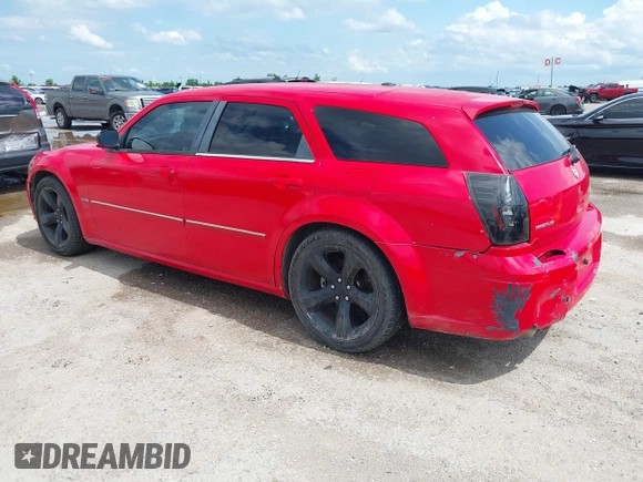 2007 Dodge Magnum R/T with VIN 2D4GV57207H867265, listed as a IAAI auction lot 42093939 with 167,007 mi miles and . Bid and sale history available at carsss.com. Image 3.