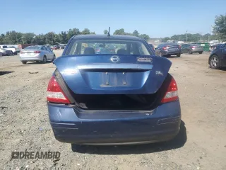 2007 Nissan Versa 1.8 SL with VIN 3N1BC11E27L432802, listed as a Copart auction lot 71018594 with 118,795 mi miles and Salvage Title. Bid and sale history available at carsss.com. Image 6.