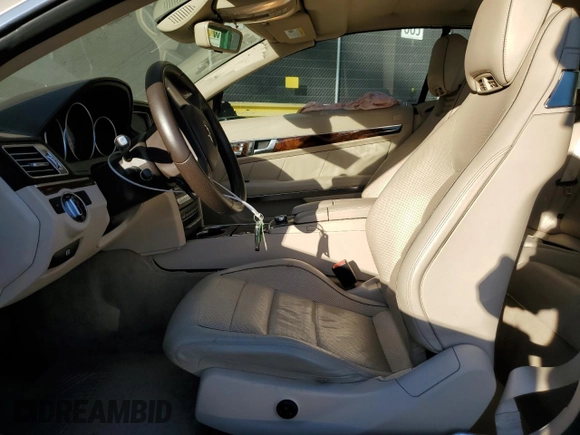 2016 Mercedes-Benz E 400 with VIN WDDKK6FF8GF334288, listed as a Copart auction lot 77405814 with 115,728 mi miles and Salvage Title. Bid and sale history available at carsss.com. Image 7.