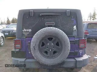 2018 Jeep Wrangler JK Unlimited Sport S with VIN 1C4BJWDGXJL836446, listed as a IAAI auction lot 41371062 with 67,112 mi miles. Bid and sale history available at carsss.com. Image 16.