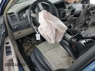 2007 Chrysler 300 Touring z VIN 2C3KA53G57H705768, wystawiony jako Copart lot #56531945 z przebiegiem 209 665 mil mil oraz Szkoda całkowita • Salvage title. Historia ofert i sprzedaży dostępna na DreamBid. Obrazek 8.