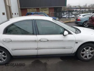 2000 Mercury Sable LS Premium with VIN 1MEFM55S5YG613920, listed as a IAAI auction lot 41360961 with 108,829 mi miles. Bid and sale history available at carsss.com. Image 13.