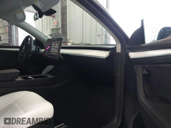 2024 Tesla Model Y Performance with VIN 7SAYGDEFXRF049338, listed as a IAAI auction lot 41240812 with 10,132 mi miles and . Bid and sale history available at DreamBid. Image 5.