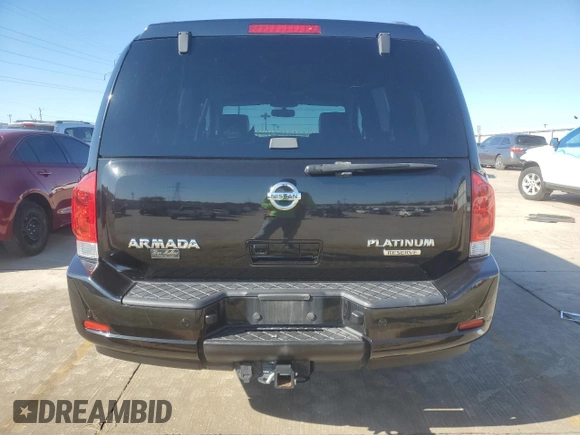 2014 Nissan Armada Platinum z VIN 5N1BA0NF8EN610303, wystawiony jako Copart lot #80653974 z przebiegiem 119 723 mil mil oraz Szkoda całkowita • Salvage title. Historia ofert i sprzedaży dostępna na DreamBid. Obrazek 6.
