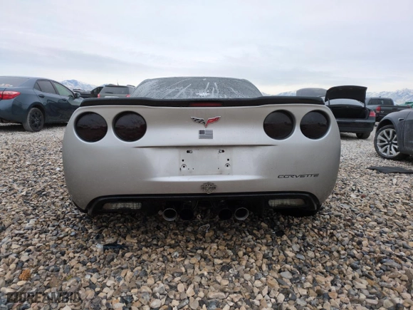 2007 Chevrolet Corvette with VIN 1G1YY26U575101588, listed as a Copart auction lot 42432415 with 94,642 mi miles and Salvage Title. Bid and sale history available at carsss.com. Image 6.