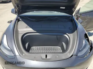 2024 Tesla Model Y Long Range с VIN 7SAYGDEE1RF060140, выставлен на аукционе Copart как лот 60923445 с пробегом 12 765 миль миль и Списание • Salvage title. История ставок и продаж доступна на DreamBid. Изображение 11.