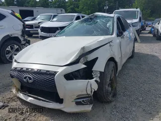 2015 Infiniti Q50 Premium with VIN JN1BV7AP1FM355889, listed as a IAAI auction lot 42212761 with 89,516 mi miles and . Bid and sale history available at DreamBid. Image 2.