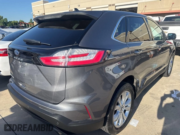 2021 Ford Edge Titanium with VIN 2FMPK3K96MBA51234, listed as a IAAI auction lot 42886659 with 74,183 mi miles and . Bid and sale history available at DreamBid. Image 15.