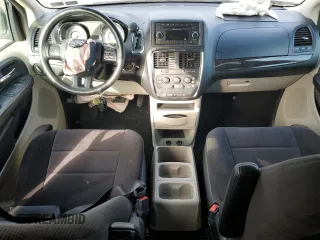 2014 Dodge Grand Caravan SE 30th Anniversary with VIN 2C4RDGBG8ER180968, listed as a Copart auction lot 49465325 with 104,430 mi miles and Salvage Title. Bid and sale history available at DreamBid. Image 8.