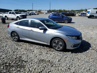 2019 Honda Civic Sedan LX with VIN 19XFC2F69KE001859, listed as a Copart auction lot 49617075 with 98,781 mi miles and Salvage Title. Bid and sale history available at carsss.com. Image 4.