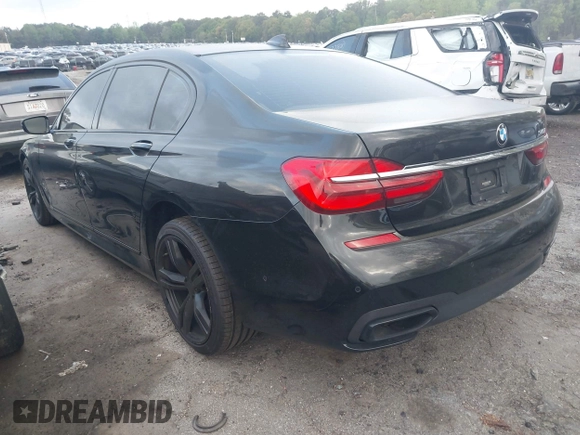 2017 BMW 7 Series 740i с VIN WBA7E2C59HG740083, выставлен на аукционе IAAI как лот 41923621 с пробегом 115 591 миль миль и . История ставок и продаж доступна на DreamBid. Изображение 3.