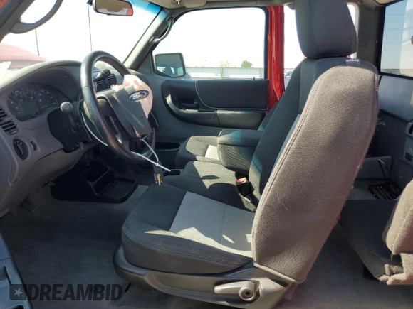2011 Ford Ranger XLT with VIN 1FTLR4FE2BPA77928, listed as a Copart auction lot 55506575 with 70,211 mi miles and Salvage title. Bid and sale history available at DreamBid. Image 7.