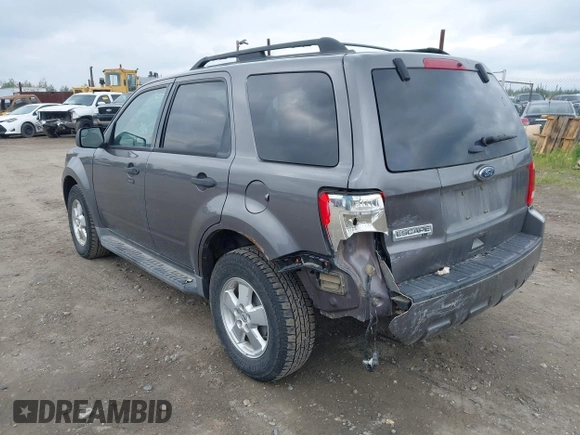 2011 Ford Escape XLT z VIN 1FMCU9D73BKA87277, wystawiony jako IAAI lot #42662242 z przebiegiem 207 649 mil mil oraz . Historia ofert i sprzedaży dostępna na DreamBid. Obrazek 3.