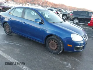 2009 Volkswagen Jetta S z VIN 3VWHM71K59M054658, wystawiony jako IAAI lot #41351338 z przebiegiem 150 686 mil mil oraz . Historia ofert i sprzedaży dostępna na DreamBid. Obrazek 1.