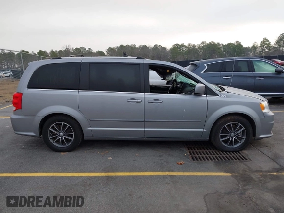 2017 Dodge Grand Caravan SXT with VIN 2C4RDGCG9HR677157, listed as a IAAI auction lot 41470342 with 66,611 mi miles and . Bid and sale history available at DreamBid. Image 13.