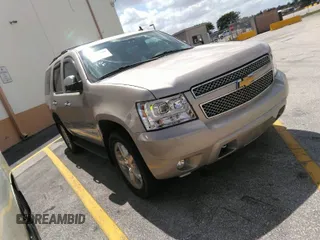 2013 Chevrolet Tahoe LT with VIN 1GNSKBE06DR127366, listed as a IAAI auction lot 41757040 with 116,206 mi miles and . Bid and sale history available at DreamBid. Image 1.