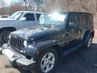 2015 Jeep Wrangler Unlimited Sahara with VIN 1C4BJWEGXFL506361, listed as a IAAI auction lot 41865418 with 80,841 mi miles. Bid and sale history available at carsss.com. Image 17.