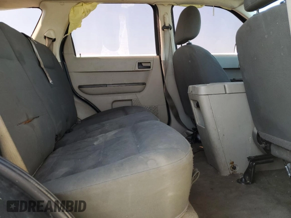 2008 Ford Escape XLS с VIN 1FMCU02Z08KB06103, выставлен на аукционе Copart как лот 60934415 с пробегом Не указан миль и Списание • Salvage title. История ставок и продаж доступна на DreamBid. Изображение 11.