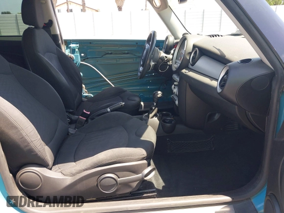 2007 MINI Hardtop with VIN WMWMF335X7TT54929, listed as a IAAI auction lot 42173757 with 71,496 mi miles and . Bid and sale history available at DreamBid. Image 5.