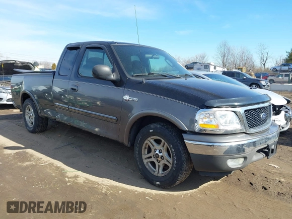 2003 Ford F-150 XL with VIN 1FTRX17W53NB00671, listed as a IAAI auction lot 41576739 with 194,066 mi miles. Bid and sale history available at carsss.com. Image 1.