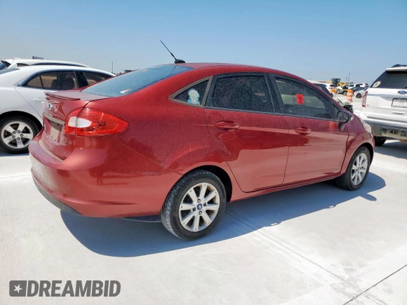 2013 Ford Fiesta SE z VIN 3FADP4BJXDM193759, wystawiony jako Copart lot #58230835 z przebiegiem 174 158 mil mil oraz Czysty tytuł • Clean title. Historia ofert i sprzedaży dostępna na DreamBid. Obrazek 3.