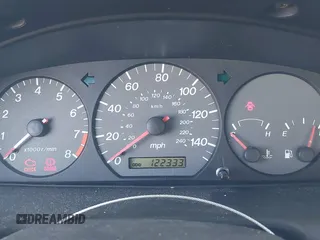2002 Mazda 626 LX with VIN 1YVGF22D925287959, listed as a IAAI auction lot 41610932 with 122,333 mi miles. Bid and sale history available at carsss.com. Image 7.
