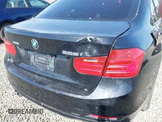 2013 BMW 3 Series 328i xDrive with VIN WBA3B5G58DNS02841, listed as a IAAI auction lot 41924431 with 106,981 mi miles. Bid and sale history available at carsss.com. Image 6.