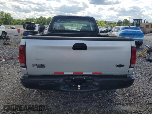 2004 Ford F-150 XL with VIN 2FTRX17W24CA52991, listed as a Copart auction lot 55853095 with 221,452 mi miles and Salvage title. Bid and sale history available at DreamBid. Image 6.