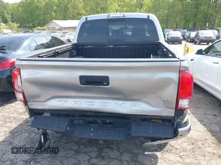 2017 Toyota Tacoma SR5 with VIN 5TFAZ5CN3HX042874, listed as a IAAI auction lot 42022752 with 104,013 mi miles and . Bid and sale history available at carsss.com. Image 6.