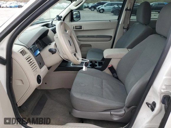 2009 Ford Escape XLS with VIN 1FMCU92749KB31140, listed as a Copart auction lot 53645705 with 213,481 mi miles and Salvage title. Bid and sale history available at DreamBid. Image 7.