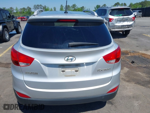 2013 Hyundai Tucson GLS with VIN KM8JU3AC3DU551018, listed as a IAAI auction lot 41988305 with 214,728 mi miles. Bid and sale history available at carsss.com. Image 16.