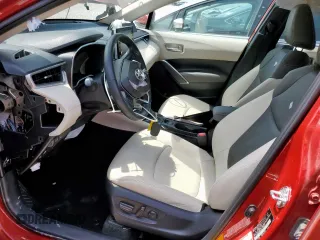 2022 Toyota Corolla Cross XLE with VIN 7MUDAAAG7NV019610, listed as a Copart auction lot 55146165 with 13,633 mi miles and Salvage title. Bid and sale history available at DreamBid. Image 7.