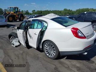 2014 Lincoln MKS with VIN 1LNHL9DK2EG612009, listed as a IAAI auction lot 39278558 with 56,893 mi miles. Bid and sale history available at carsss.com. Image 3.
