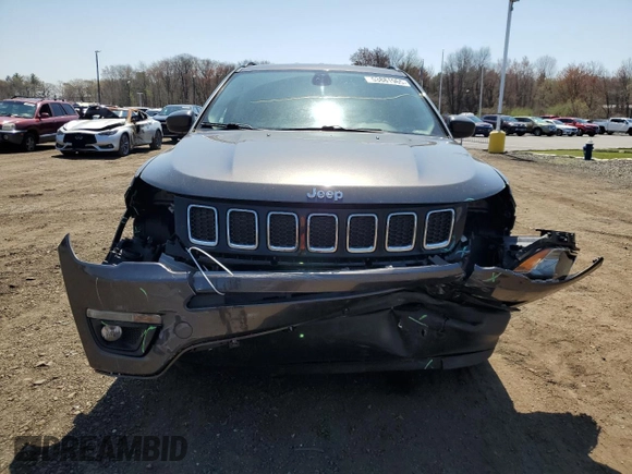 2018 Jeep Compass Latitude z VIN 3C4NJDBB5JT303871, wystawiony jako Copart lot #53881965 z przebiegiem 130 061 mil mil oraz Szkoda całkowita • Salvage title. Historia ofert i sprzedaży dostępna na DreamBid. Obrazek 5.