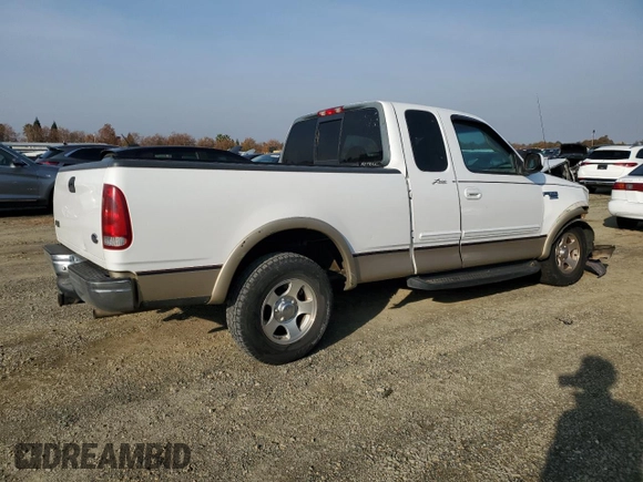 1999 Ford F-150 XL with VIN 1FTRX17L2XKC10123, listed as a Copart auction lot 83158894 with 57,446 mi miles and Salvage Title. Bid and sale history available at carsss.com. Image 3.