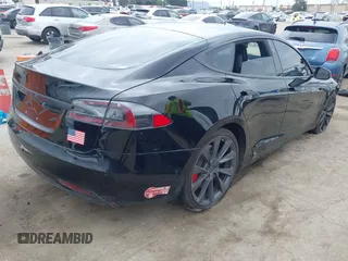2017 Tesla Model S 60 with VIN 5YJSA1E12HF195965, listed as a IAAI auction lot 41946148 with 63,992 mi miles and . Bid and sale history available at DreamBid. Image 4.