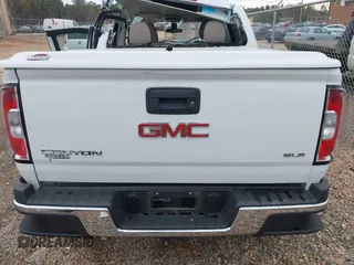 2015 GMC Canyon 2WD SLE with VIN 1GTG5BE33F1132736, listed as a IAAI auction lot 41094687 with 26,185 mi miles. Bid and sale history available at carsss.com. Image 16.