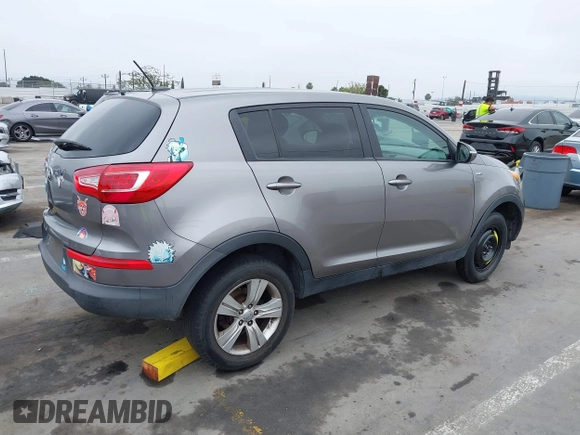 2013 Kia Sportage LX with VIN KNDPBCA23D7529658, listed as a IAAI auction lot 42473877 with 114,797 mi miles and . Bid and sale history available at DreamBid. Image 4.