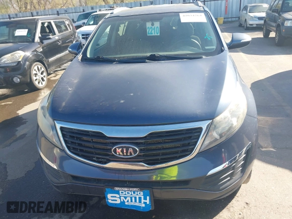2012 Kia Sportage LX with VIN KNDPBCA28C7273676, listed as a IAAI auction lot 42034764 with 121,527 mi miles and . Bid and sale history available at DreamBid. Image 6.