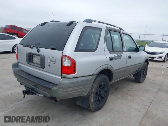 2000 Isuzu Rodeo S with VIN 4S2CK58W3Y4308219, listed as a IAAI auction lot 41939765 with 241,486 mi miles and . Bid and sale history available at DreamBid. Image 4.