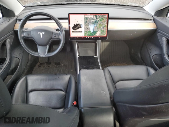 2019 Tesla Model 3 Mid Range with VIN 5YJ3E1EA1KF397390, listed as a Copart auction lot 49862915 with 63,698 mi miles and Salvage Title. Bid and sale history available at carsss.com. Image 8.