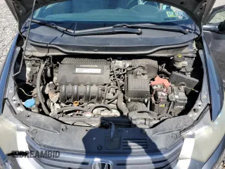 2010 Honda Insight LX z VIN JHMZE2H59AS000085, wystawiony jako Copart lot #54932975 z przebiegiem 218 961 mil mil oraz Szkoda całkowita • Salvage title. Historia ofert i sprzedaży dostępna na DreamBid. Obrazek 11.